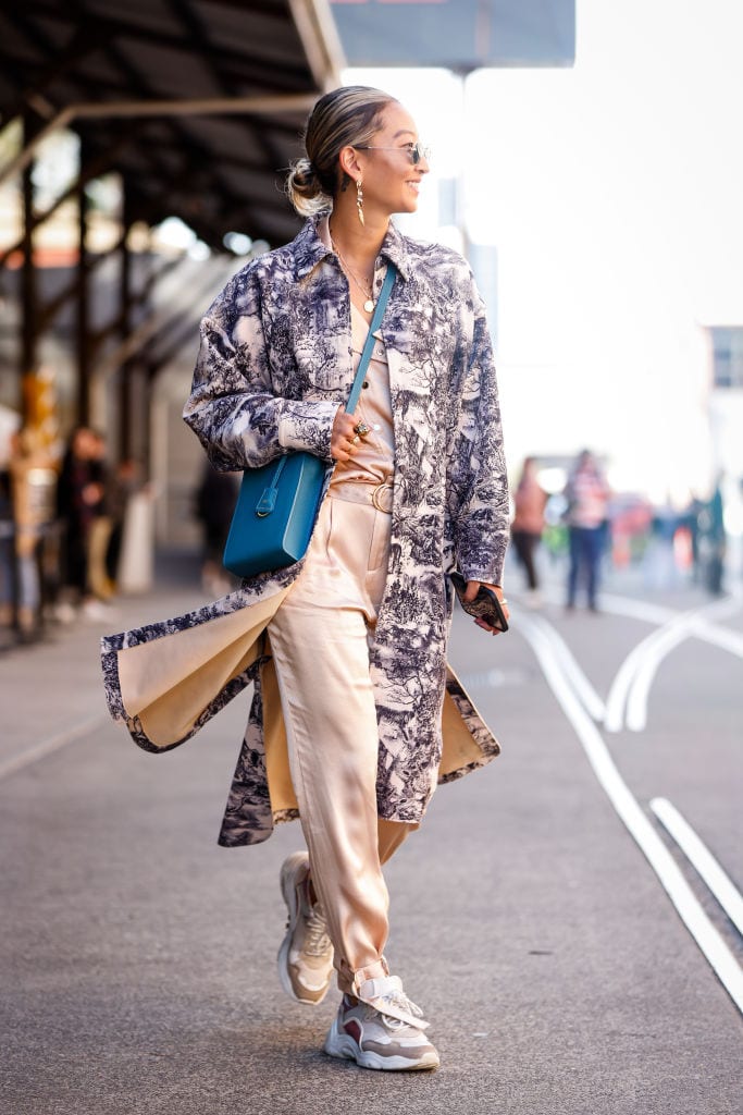 Sarah Ellen wearing Louis Vuitton net top, knit vest, bag and combat  News Photo - Getty Images